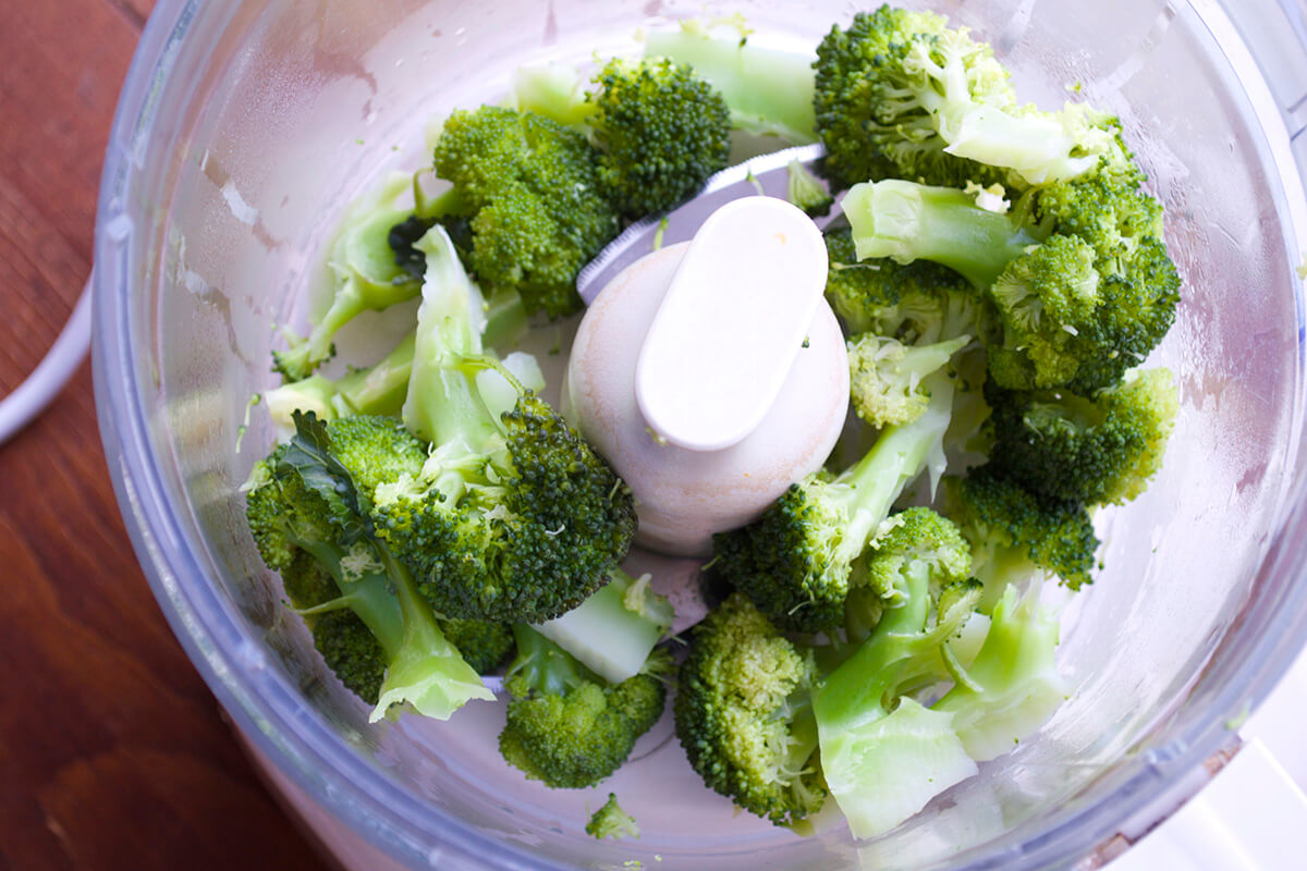 Broccoli florets in a food processor